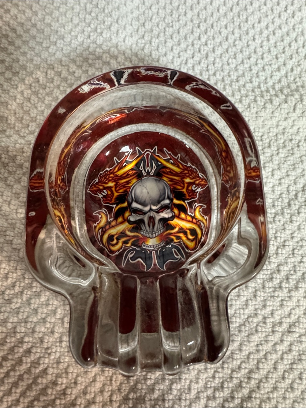 Source Unknown Clear Glass Ashtray with Red and Orange Flame Skull